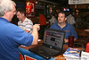 Gator Country Photo Galleries > photo by Tim Casey

Gator Country Advertising Director James Irvine speaks with a guest during the seventh Gator Country Caravan stop on Tuesday, July 29, 2008 at the Press Box Sports Bar in Tampa, Fla.
