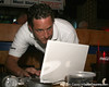 Gator Country Photo Galleries > photo by Tim CaseyGator Country Video Director Brenden Martin prepares to broadcast on the internet during the eighth stop of the Gator Country Caravan on Wednesday, July 30, 2008 at the Friendly Confines Sports Restaurant in Winter Park, Fla.